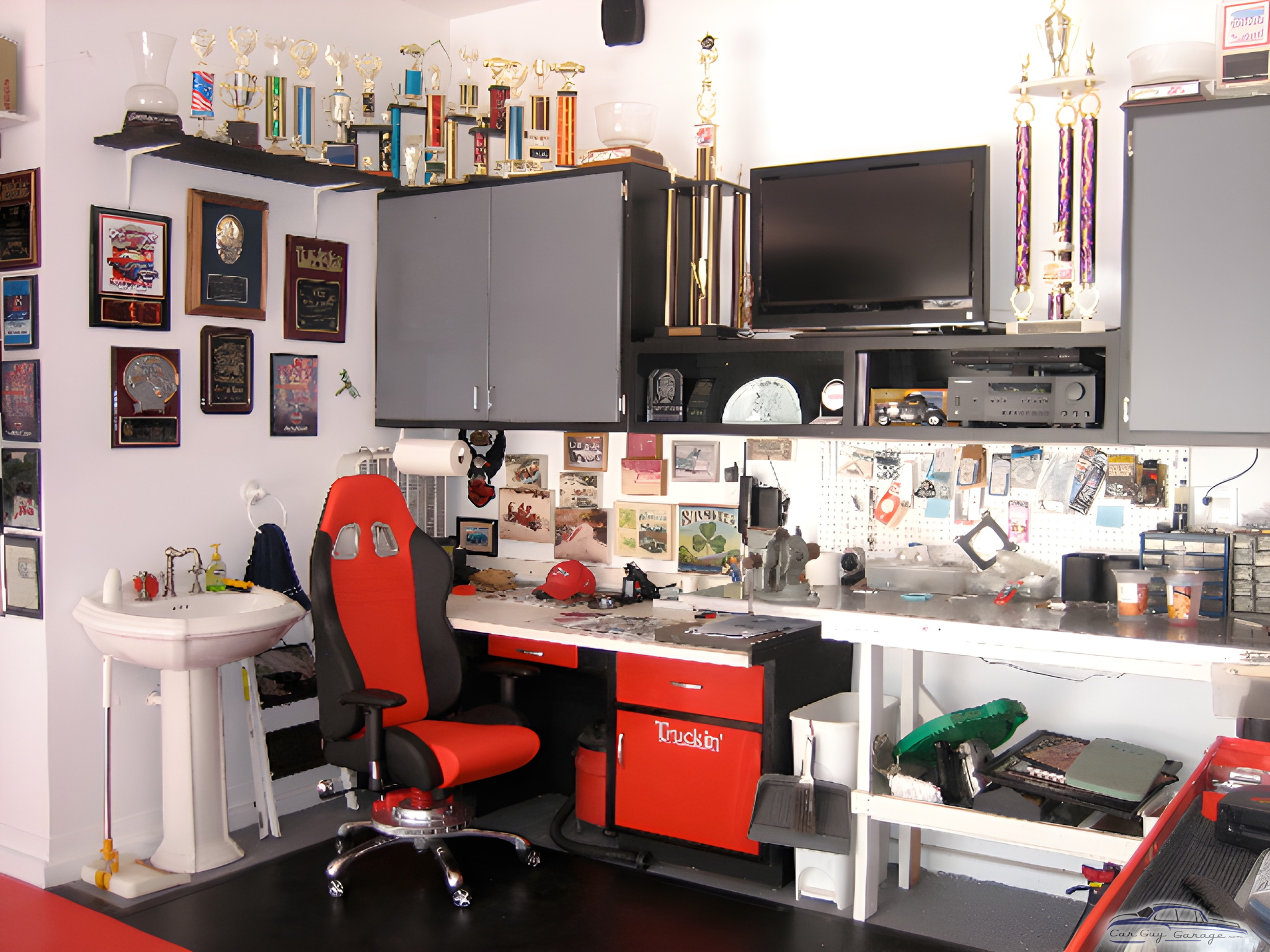 Organized garage workspace with cabinets and racing chair - Ira from Upland, CA