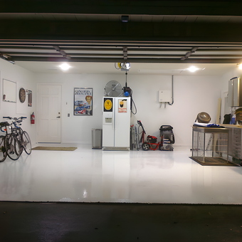 Organized garage with storage cabinets and bikes - David from Oviedo, FL