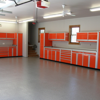 Modern Garage With Orange Aluminum Cabinets and Storage - Custom Aluminum