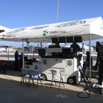 Racing Pit Setup with Monitors, Chairs, and Tire Cart - Custom Aluminum
