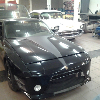 Classic and Custom Cars in Garage Workshop - curtiscustoms.com