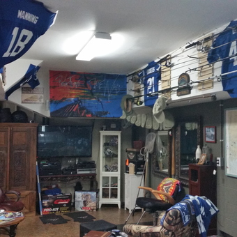 Sports Memorabilia and Fishing Rods Displayed in Garage - Brandon Carroll from Hollywood, S. Carolina