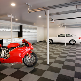 Modern garage with checkered flooring and storage cabinets - Usman from Sialkot, Pakistan