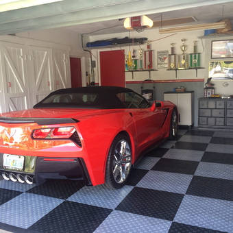 Red Corvette, Checkered Garage Flooring, Cabinets and Trophies - Suzie-Q from Pompano Beach, FL