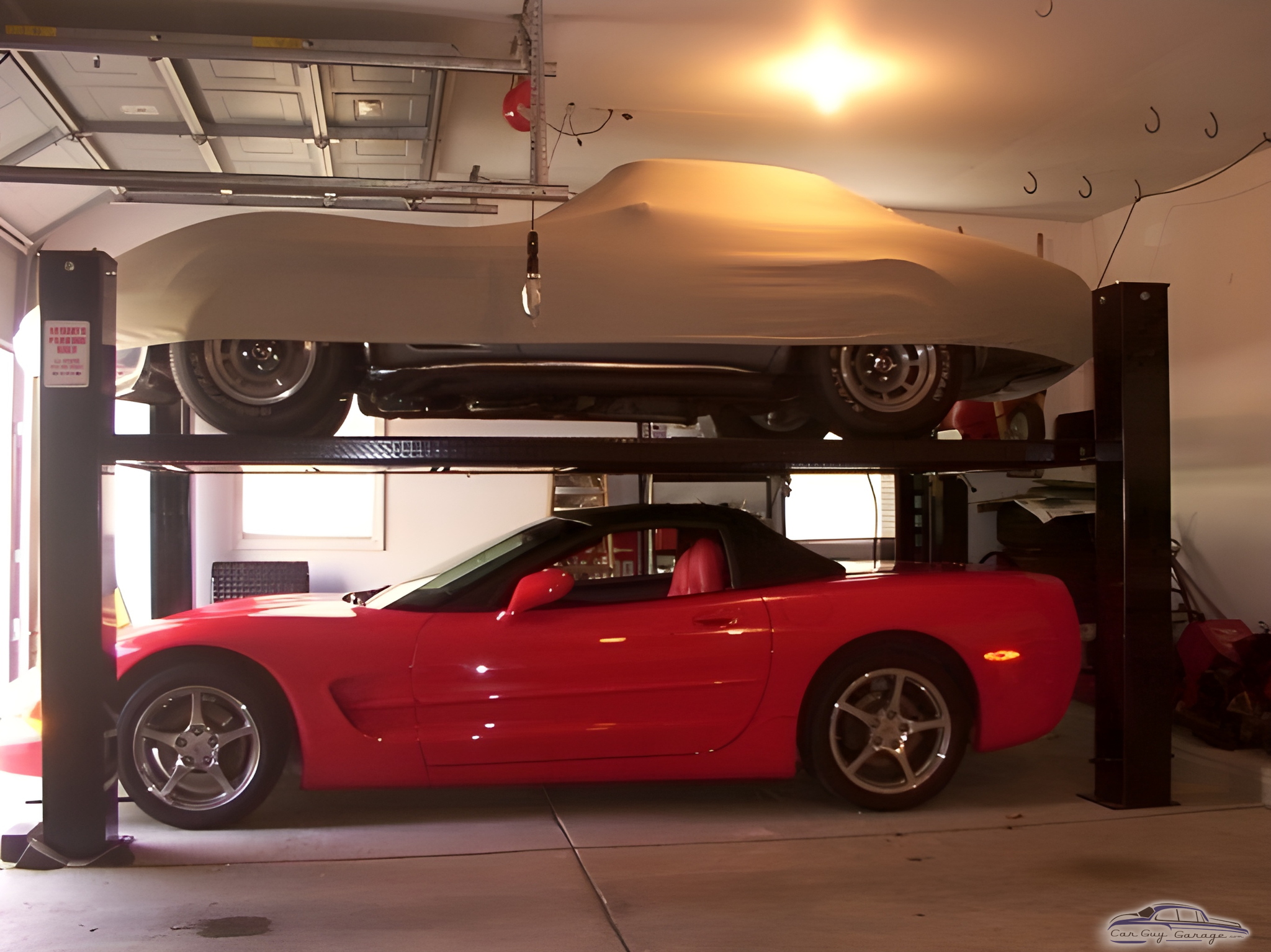 Two Corvettes on Four Post Lift in Garage - ToNY from Leland, NC