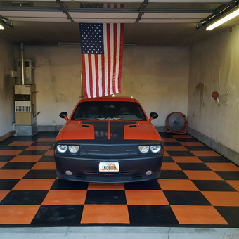 Garage with Orange Black Tile Floor and Storage - the Willard from Fairview, Utah