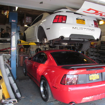 Garage with Two Ford Mustangs, Car Lift, and Tools - Howie from East Yaphank, NY