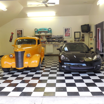 Classic and Modern Cars in Checkered Floor Garage - d from Bensenville, IL