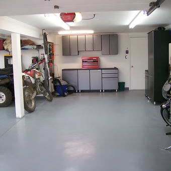 Organized garage with cabinets, tool chest, and vehicles - Peter from Lakewood, CO