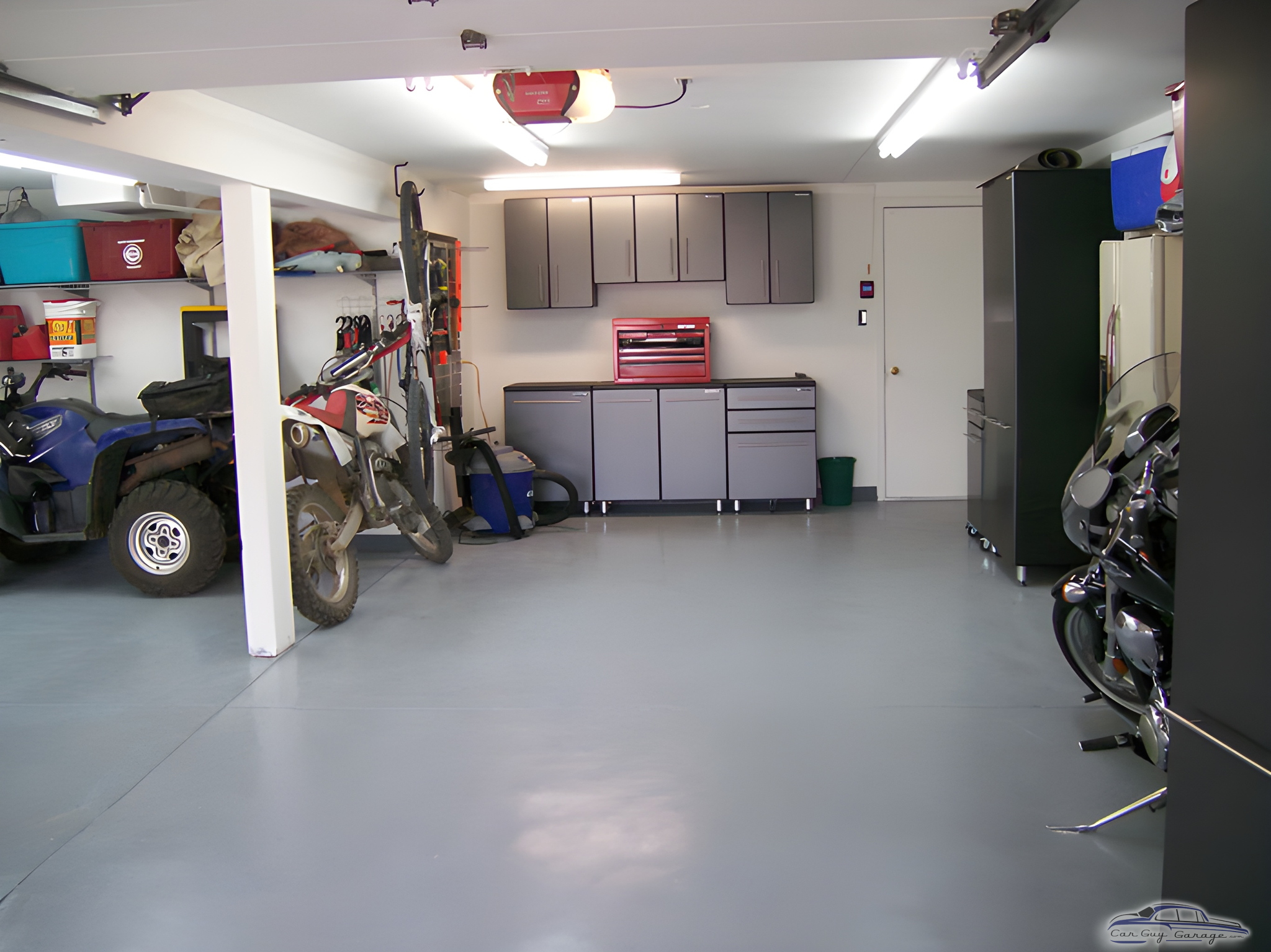 Organized garage with cabinets, tool chest, and vehicles - Peter from Lakewood, CO