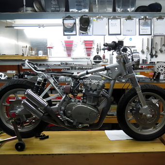 Custom Motorcycle Build in Organized Garage Workshop - Richard
