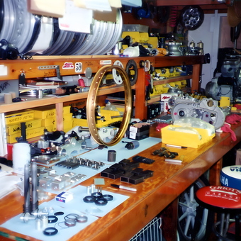 Organized Garage Workbench with Tools and Parts - Richard