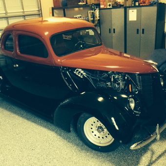 Classic Car With Black Cabinets And Epoxy Floor - Garage Mahal from Tomball, Texas