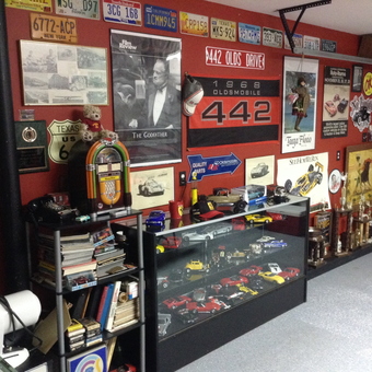 Classic Car Memorabilia Wall with Models and Signs - Dads MANCAVE