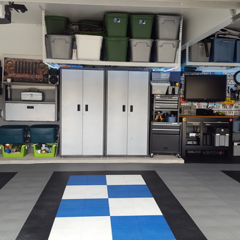 Organized Garage With Cabinets, Storage Bins, and Tile Flooring - S2online from Richmond, TX