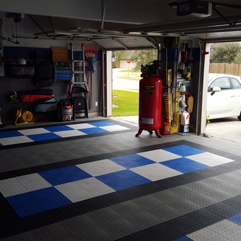 Organized Garage with Tile Flooring and Air Compressor - S2online from Richmond, TX