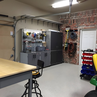 Organized garage with cabinets, workbench, and storage - Jay from Parker, TX