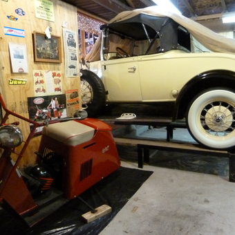 Classic Car on Lift and Vintage Scooter Display - Karl Richter from Keshena, Wisconsin