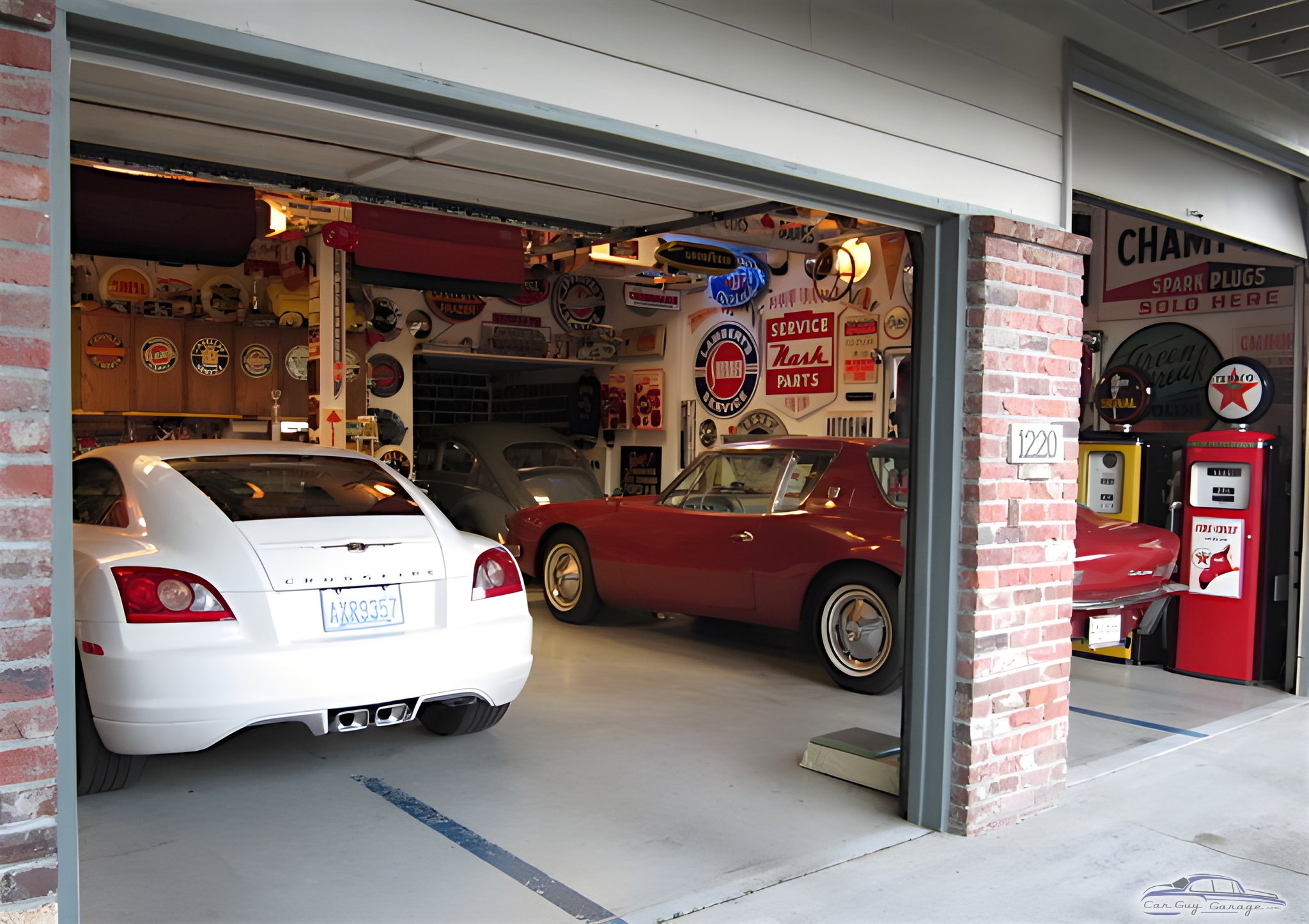 Classic Car Garage with Vintage Signs and Gas Pumps - Lance Lambert