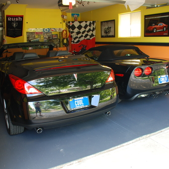 Two Sports Cars in Decorated Garage with Wall Art - Daniel Vielhaber from Indianapolis, In