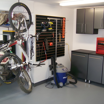 Organized garage with bike rack, tool cabinets, and wall storage - Peter from Lakewood, CO