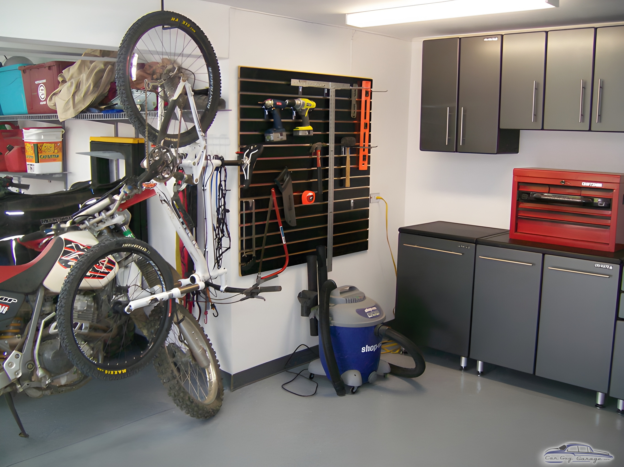 Organized garage with bike rack, tool cabinets, and wall storage - Peter from Lakewood, CO