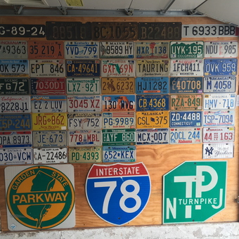 Wall Display of License Plates and Road Signs - Eddie from Union, New Jersey