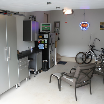 Modern garage with cabinets, seating, and bike storage - Kevin from Little Silver, NJ