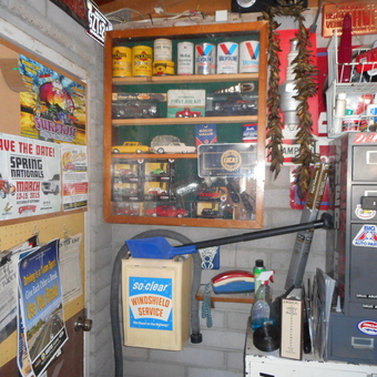 Classic Garage Decor with Oil Cans and Car Models - Mauirebel from Mesa, Arizona