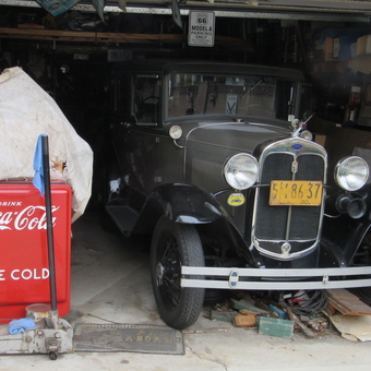 Vintage car, Coca-Cola cooler, and tools in garage - GRITFY from Burbank, CA