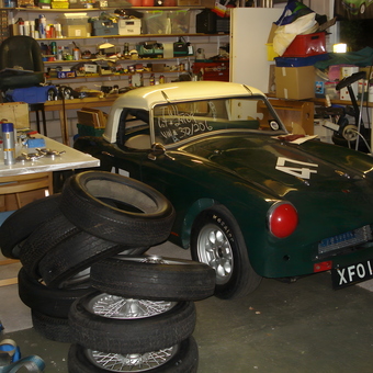 Classic Race Car, Spare Tires, and Tools in Busy Garage - Tony from Garvestone, Norfolk
