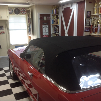 Classic car garage with trophies, gas pump, and signs - Steve from Van Alstyne, Texas
