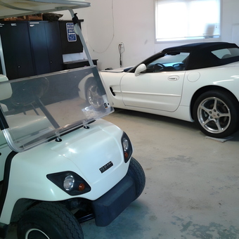 Garage with White Corvette, Golf Cart, and Cabinets - Dave from Mono, Ontario