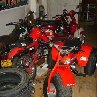 Motorcycles, ATVs, and Spare Tires in Organized Garage - ricardo from Pasto, Narino Colombia