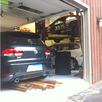 Garage with Car Lift, Stacked Tires, and VW GTI - Greg from Middletown, CT