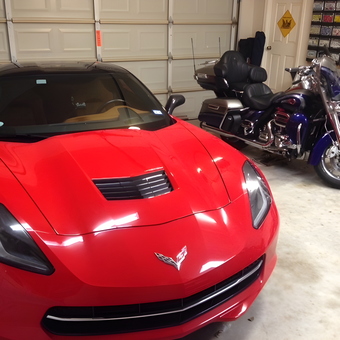 Red Corvette and Touring Motorcycle in Clean Garage - Marine LDO from Houston, TX