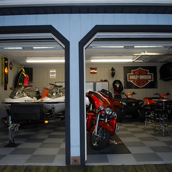 Organized Garage With Motorcycles, Jet Skis, and Wall Decor - Mark from Perrysville, Ohio