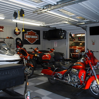 Garage with Harley Motorcycles, ATVs, and Wall Storage - Mark from Perrysville, Ohio