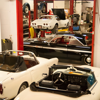 Classic Cars and Auto Lift in Organized Garage - MotoeXotica from St. Louis, MO