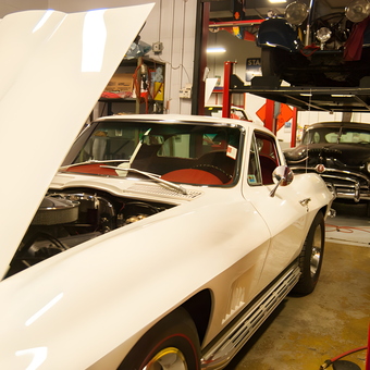 Classic Cars and Car Lift in Organized Garage - MotoeXotica from St. Louis, MO
