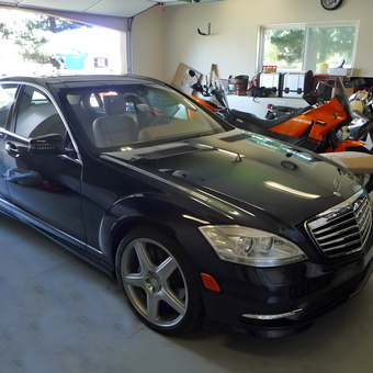 Luxury Car and Motorcycles in Organized Garage - Geckoboy from Chico, CA