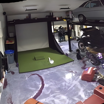 Custom epoxy garage with car lift and golf simulator - Pestymegal from Beloit, KS