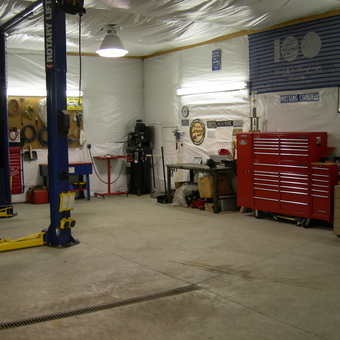 Organized garage with car lift and tool cabinets - ScodeMike from Monument, Colorado