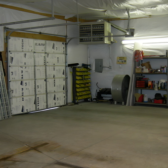 Organized garage with shelving, tool storage, and heater - ScodeMike from Monument, Colorado