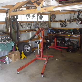 Organized garage with engine hoists and tools - Joe from Parkland, WA