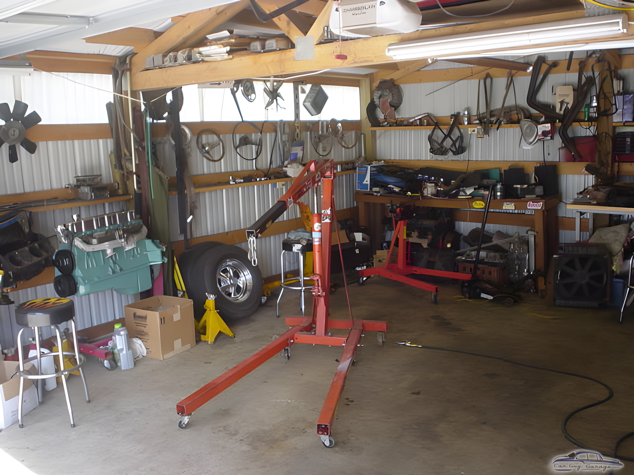 Organized garage with engine hoists and tools - Joe from Parkland, WA