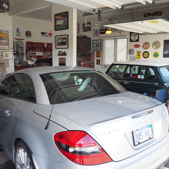 Organized garage with classic cars, wall art, and tools - Rich from Lawrence, Kansas