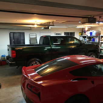 Organized garage with shelving and two cars - ChrisStyleG from POPLAR BLUFF, Missouri