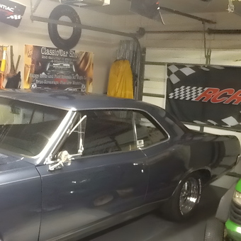 Classic car garage with banners and tools - Old goat from Lake Worth, Florida