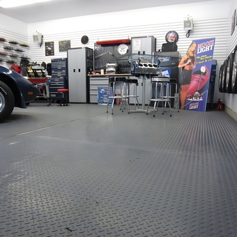 Organized garage with tool cabinets and diamond flooring - Tepot from Shediac, NB
